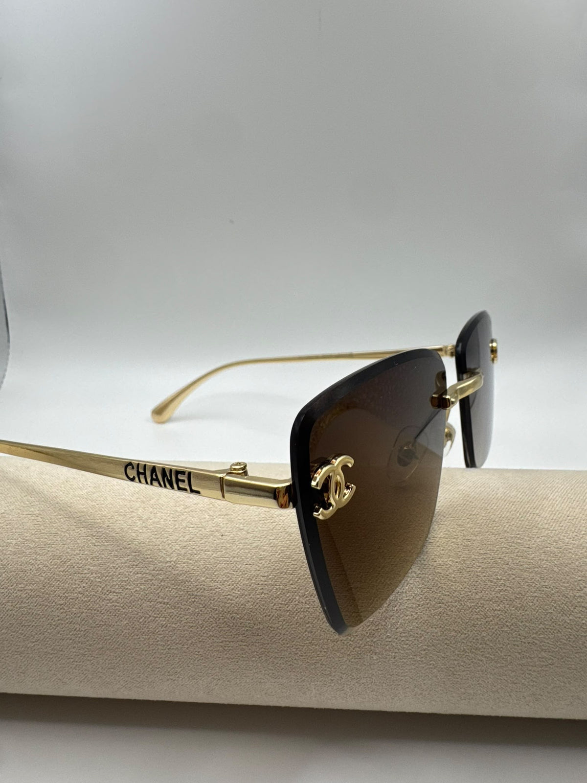 Large Cat-eye Rimless Tan C Sunglasses
